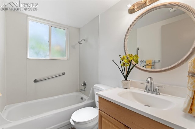 2115 Friendship Cir, Colorado Springs, CO 80904 - bathroom featuring toilet, vanity, and washtub / shower combination