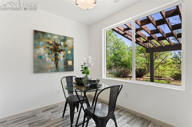 2115 Friendship Cir, Colorado Springs, CO 80904 - dining space with baseboards and wood finished floors