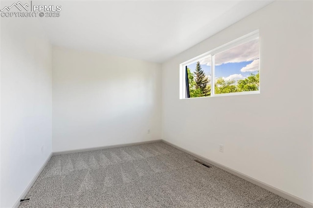 2115 Friendship Cir, Colorado Springs, CO 80904 - spare room featuring carpet floors and baseboards