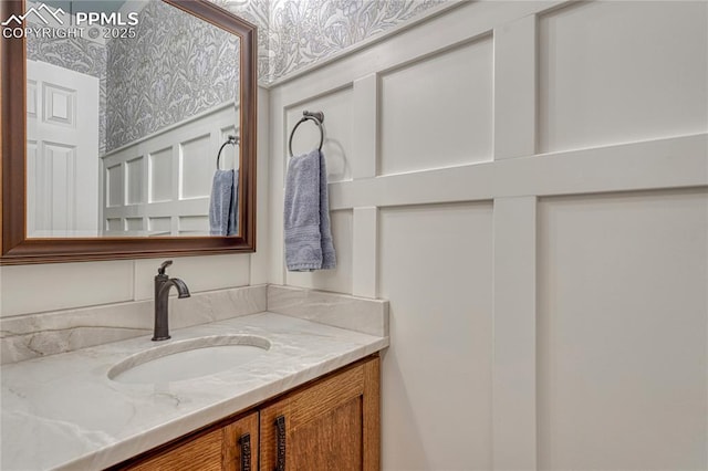 2044 Coldstone Way, Colorado Springs, CO 80921 - bathroom with vanity and wallpapered walls
