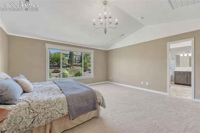 2044 Coldstone Way, Colorado Springs, CO 80921 - bedroom featuring lofted ceiling, light colored carpet, baseboards, a chandelier, and connected bathroom