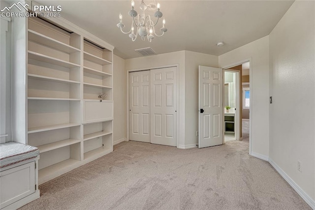 2044 Coldstone Way, Colorado Springs, CO 80921 - unfurnished bedroom with carpet flooring, a chandelier, baseboards, and a closet