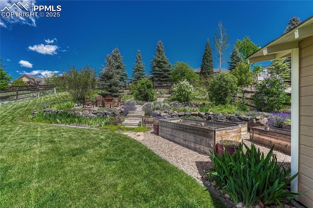 2044 Coldstone Way, Colorado Springs, CO 80921 - view of yard with a vegetable garden