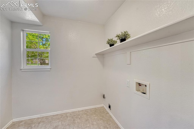 9524 Pinebrook Way, Colorado Springs, CO 80920 - washroom with washer hookup and baseboards
