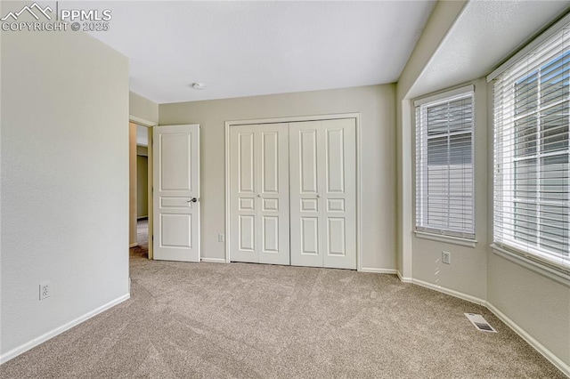 9524 Pinebrook Way, Colorado Springs, CO 80920 - unfurnished bedroom with carpet flooring, multiple windows, and baseboards