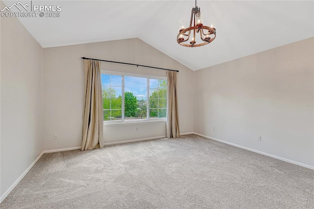 9524 Pinebrook Way, Colorado Springs, CO 80920 - carpeted empty room with a chandelier, vaulted ceiling, and baseboards