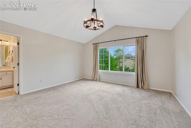 9524 Pinebrook Way, Colorado Springs, CO 80920 - spare room with a chandelier, light carpet, vaulted ceiling, and baseboards