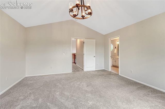 9524 Pinebrook Way, Colorado Springs, CO 80920 - empty room with a chandelier, light carpet, lofted ceiling, and baseboards