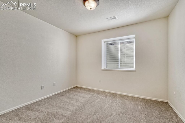 9524 Pinebrook Way, Colorado Springs, CO 80920 - carpeted empty room featuring baseboards and a textured ceiling