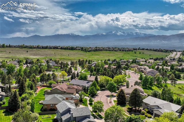 9524 Pinebrook Way, Colorado Springs, CO 80920 - aerial perspective of suburban area featuring a mountainous background