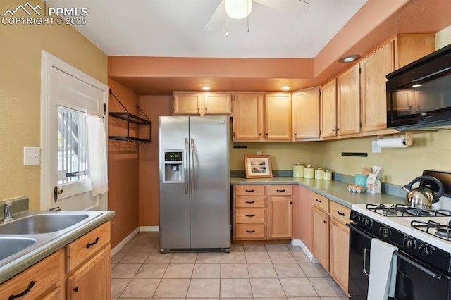 1003 N Institute St, Colorado Springs, CO 80903 - kitchen featuring stainless steel fridge with ice dispenser, gas range oven, black microwave, ceiling fan, and light tile patterned floors