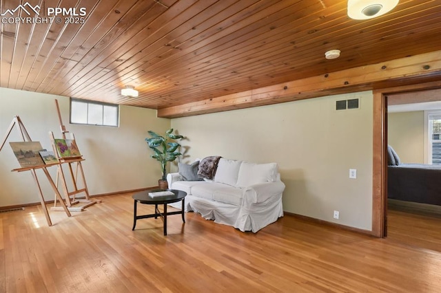 1003 N Institute St, Colorado Springs, CO 80903 - sitting room featuring wood finished floors, wood ceiling, baseboards, and plenty of natural light