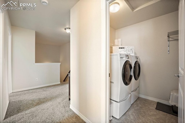 laundry room featuring separate washer and dryer, baseboards, and carpet flooring