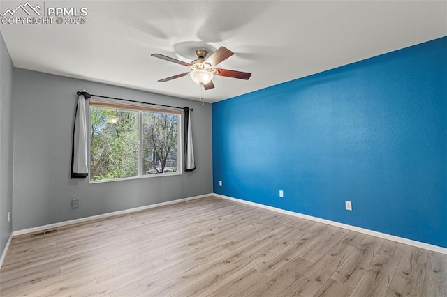 2265 Sage Grouse Ln, Colorado Springs, CO 80951 - unfurnished room with a ceiling fan, wood finished floors, and baseboards
