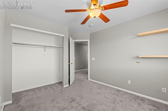 2265 Sage Grouse Ln, Colorado Springs, CO 80951 - unfurnished bedroom featuring carpet floors, a closet, baseboards, and a ceiling fan