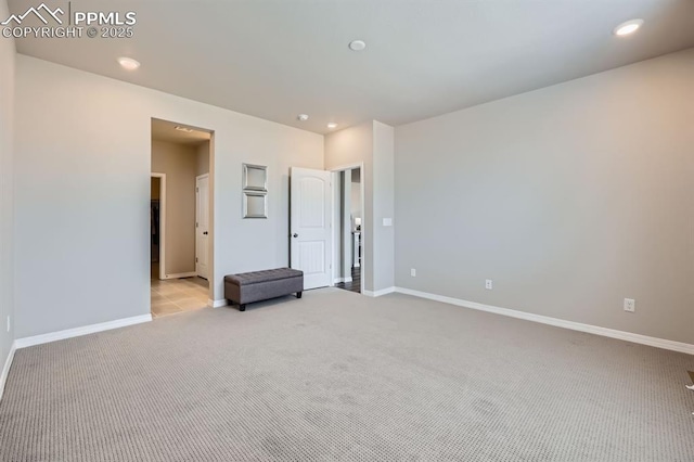 10737 Rolling Mesa Dr, Falcon, CO 80831 - unfurnished bedroom with light carpet, recessed lighting, and baseboards