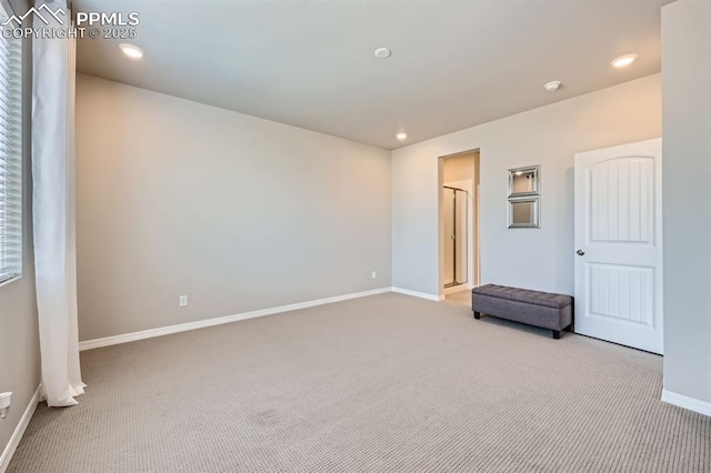 10737 Rolling Mesa Dr, Falcon, CO 80831 - unfurnished bedroom featuring carpet floors, baseboards, and recessed lighting