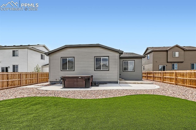 10737 Rolling Mesa Dr, Falcon, CO 80831 - rear view of property featuring a hot tub and a patio area