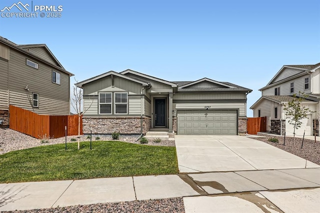 10737 Rolling Mesa Dr, Falcon, CO 80831 - view of front facade with an attached garage, stone siding, concrete driveway, and board and batten siding