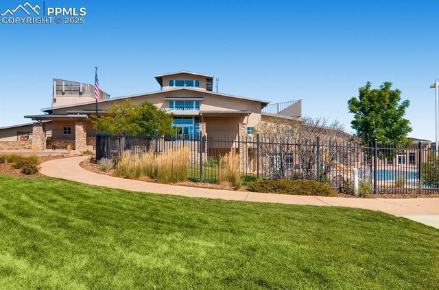 10737 Rolling Mesa Dr, Falcon, CO 80831 - view of front of house featuring stucco siding