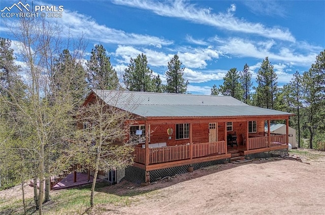 view of front of property with metal roof