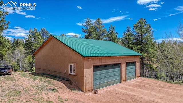 view of detached garage
