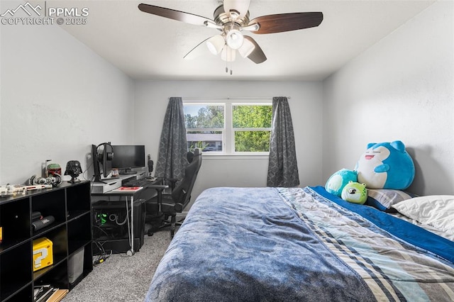 2744 Ron Ct, Colorado Springs, CO 80909 - carpeted bedroom with a ceiling fan and a desk