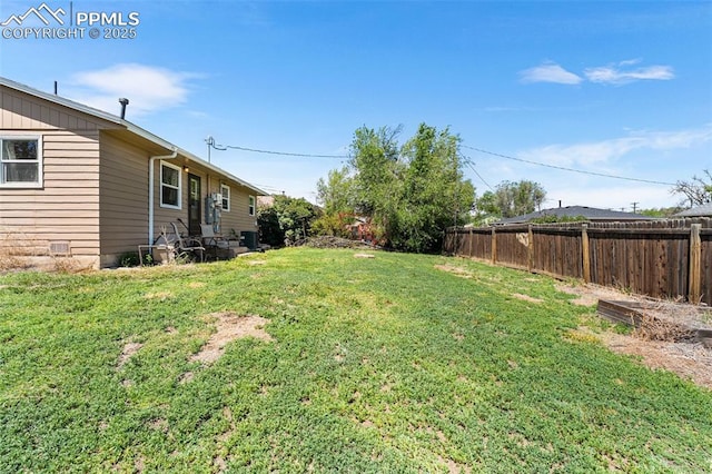 2744 Ron Ct, Colorado Springs, CO 80909 - view of yard with central AC
