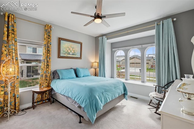 6949 Compass Bend Dr, Colorado Springs, CO 80927 - bedroom with carpet flooring, baseboards, and a ceiling fan