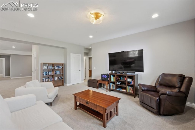6949 Compass Bend Dr, Colorado Springs, CO 80927 - living area featuring light carpet, recessed lighting, and baseboards