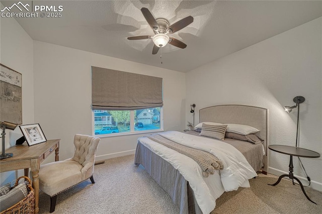 15872 Maple Hill Rd, Monument, CO 80132 - carpeted bedroom with baseboards and ceiling fan