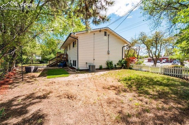 2506 Templeton Gap Rd, Colorado Springs, CO 80907 - view of home's exterior with cooling unit and fence