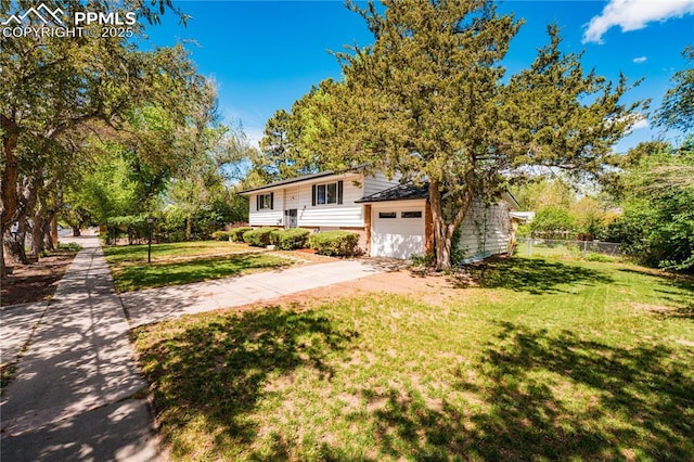 2506 Templeton Gap Rd, Colorado Springs, CO 80907 - view of front of house with concrete driveway and an attached garage