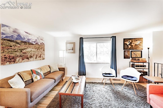 2506 Templeton Gap Rd, Colorado Springs, CO 80907 - living area with light wood-style flooring and baseboards