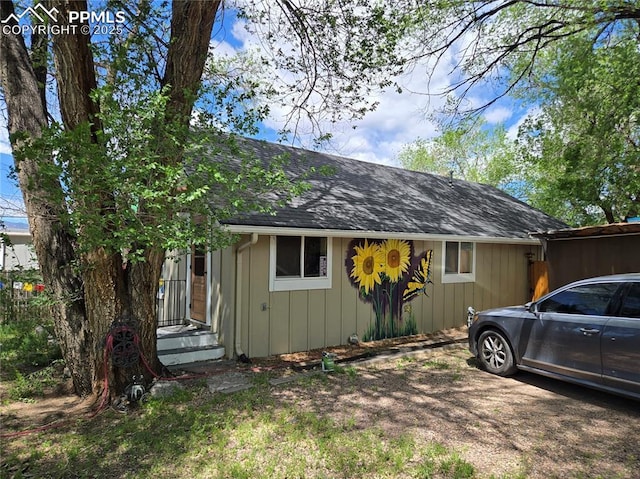 46 Sunflower Rd, Colorado Springs, CO 80907 - view of side of property with roof with shingles