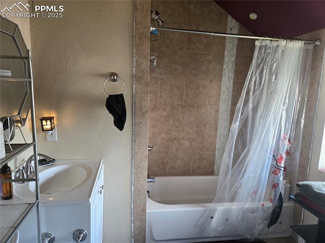 46 Sunflower Rd, Colorado Springs, CO 80907 - full bath featuring a textured wall, shower / bath combo, and vanity