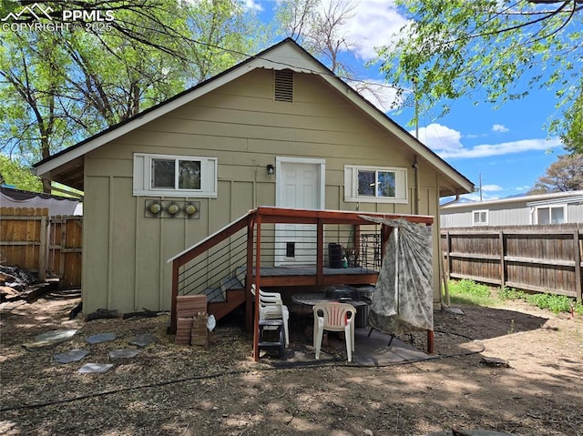 46 Sunflower Rd, Colorado Springs, CO 80907 - back of property featuring fence and board and batten siding
