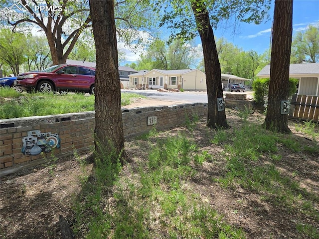 46 Sunflower Rd, Colorado Springs, CO 80907 - view of yard featuring fence and a residential view