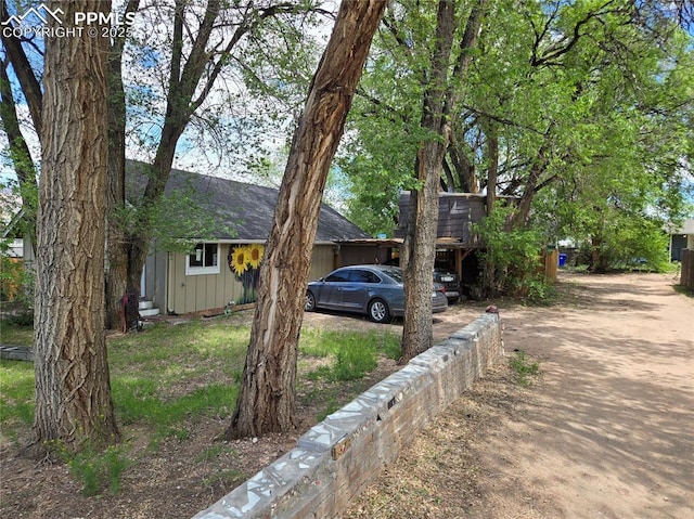 46 Sunflower Rd, Colorado Springs, CO 80907 - view of front of home with roof with shingles and driveway