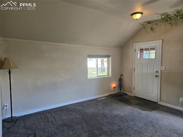 46 Sunflower Rd, Colorado Springs, CO 80907 - carpeted entryway featuring lofted ceiling and baseboards