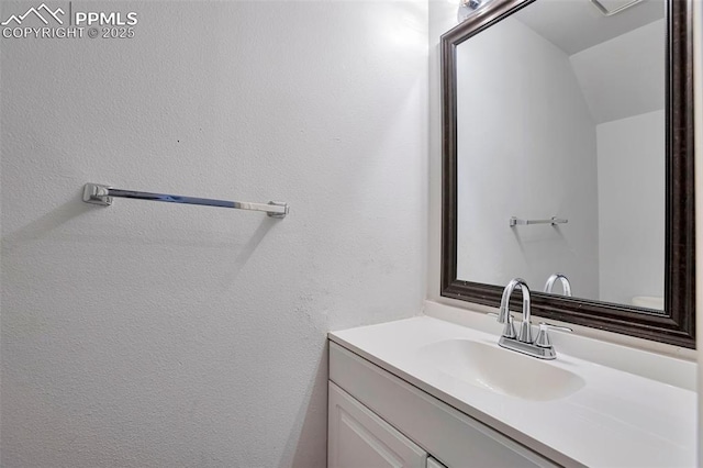514 Shady Crest Cir, Colorado Springs, CO 80916 - bathroom featuring vanity and lofted ceiling