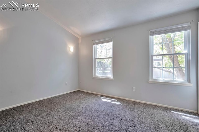 514 Shady Crest Cir, Colorado Springs, CO 80916 - carpeted spare room featuring vaulted ceiling and baseboards
