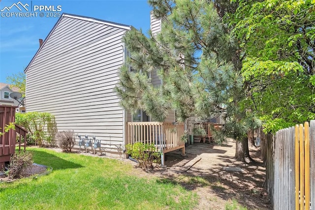 514 Shady Crest Cir, Colorado Springs, CO 80916 - view of home's exterior featuring a deck and a chimney