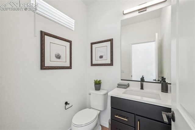 6913 Knapp Dr, Colorado Springs, CO 80924 - bathroom featuring vanity and toilet