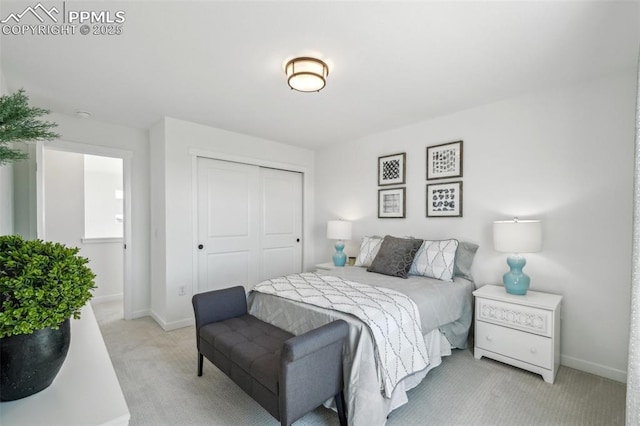 6913 Knapp Dr, Colorado Springs, CO 80924 - bedroom with light carpet, a closet, and baseboards