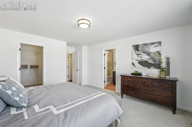 6913 Knapp Dr, Colorado Springs, CO 80924 - bedroom featuring baseboards, light colored carpet, and ensuite bath