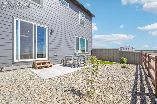 6913 Knapp Dr, Colorado Springs, CO 80924 - fenced backyard featuring a patio area