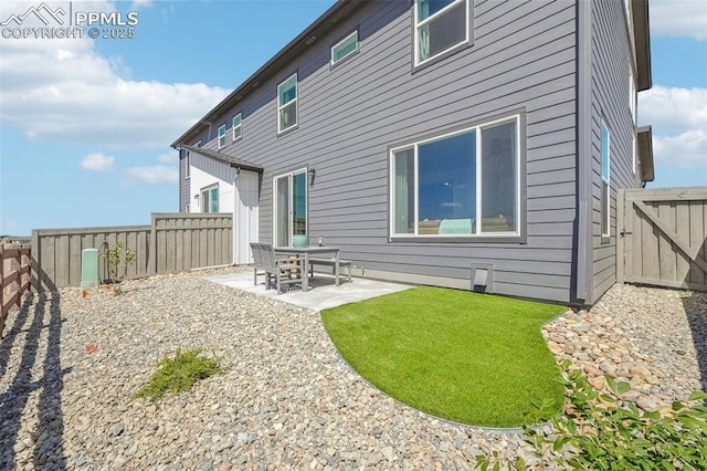 6913 Knapp Dr, Colorado Springs, CO 80924 - back of house featuring a patio and a fenced backyard