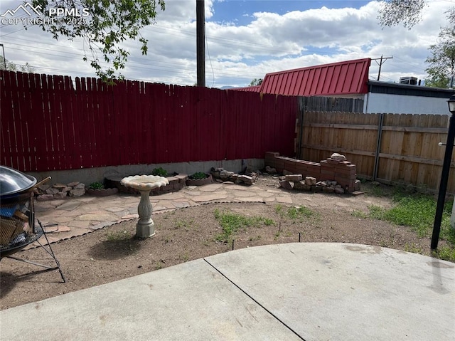 2531 Gunnison St, Colorado Springs, CO 80909 - fenced backyard with a patio