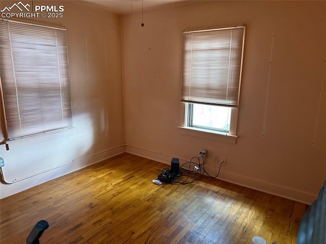 2531 Gunnison St, Colorado Springs, CO 80909 - empty room featuring hardwood / wood-style flooring and baseboards